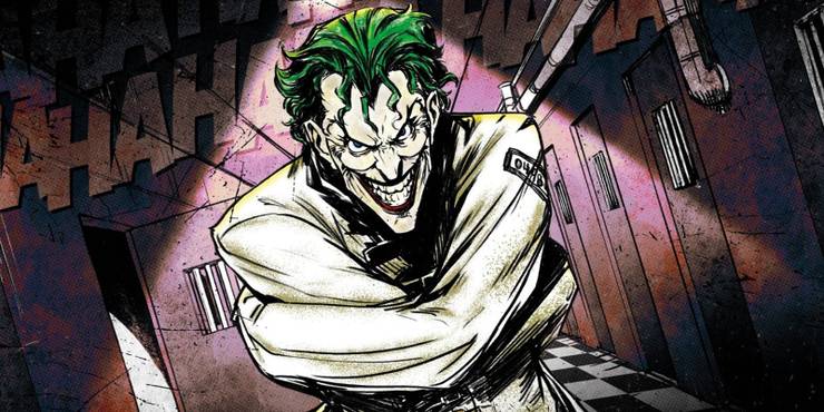 The Joker laughing in a straightjacket in Arkham Asylum.jpg?q=50&fit=crop&w=740&h=370&dpr=1