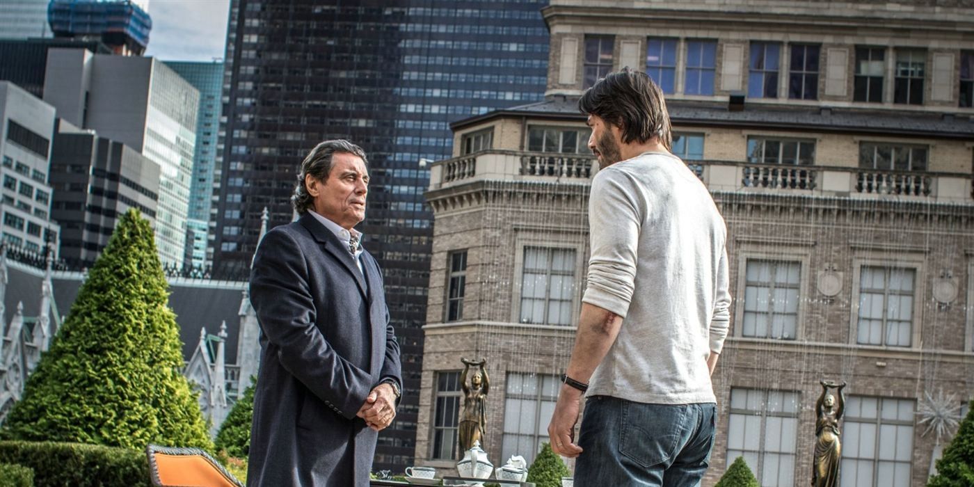 Ian McShane as Winston and Keanu Reeves as John Wick in John Wick