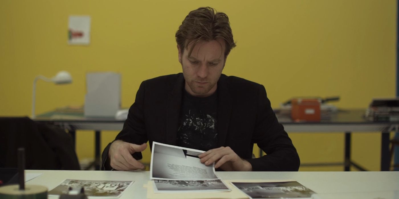 Oliver looking at photos in Beginners