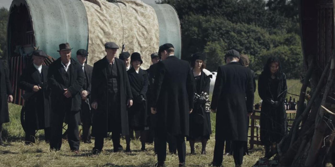 Family and friends attend the funeral of John Shelby in Peaky Blinders