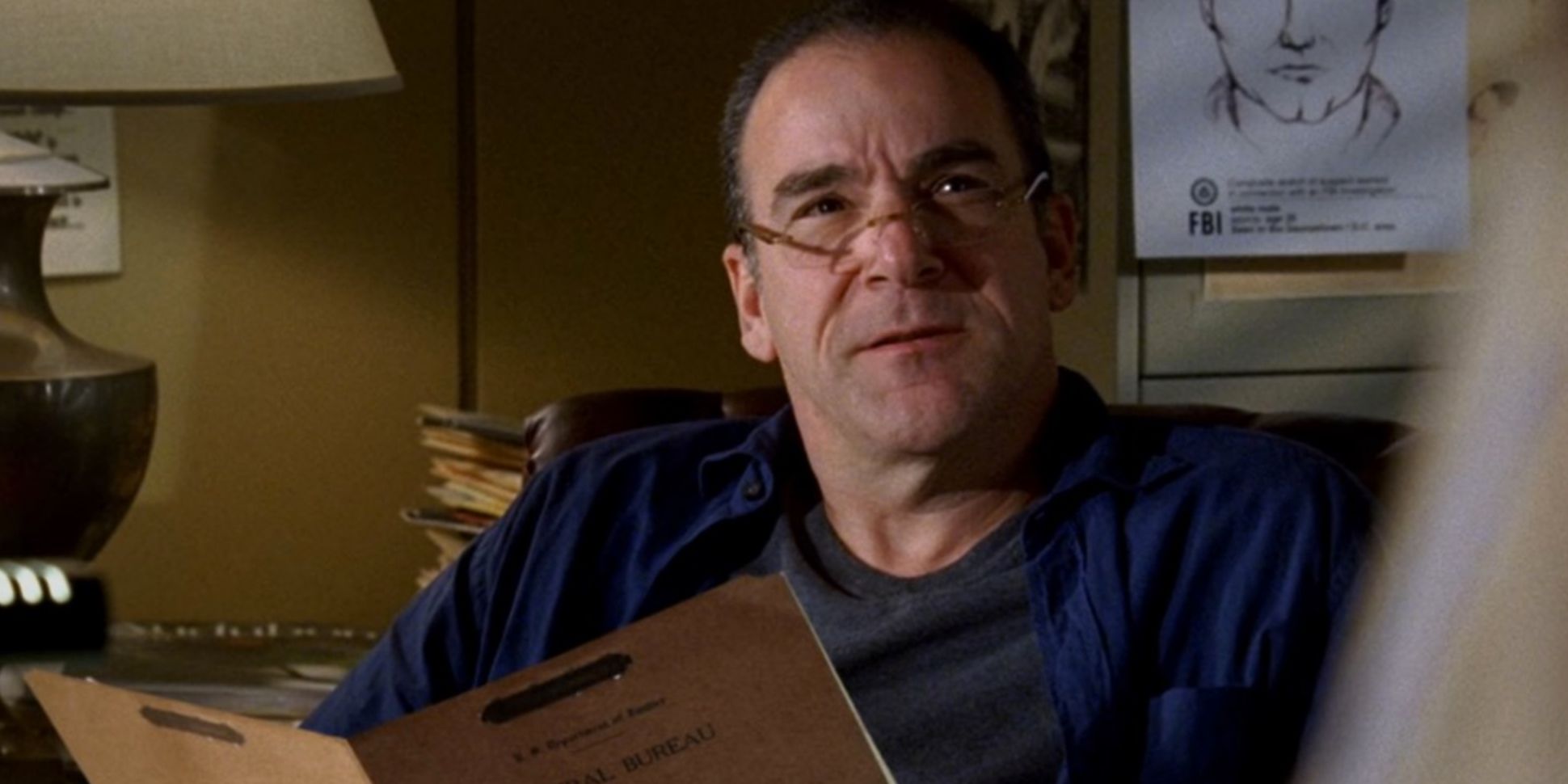 Jason Gideon sits in his office reading a file in Criminal Minds