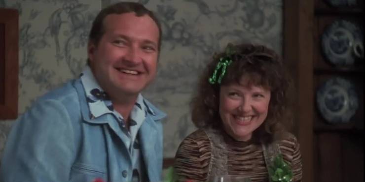 Cousin Eddie and Catherine at family dinner