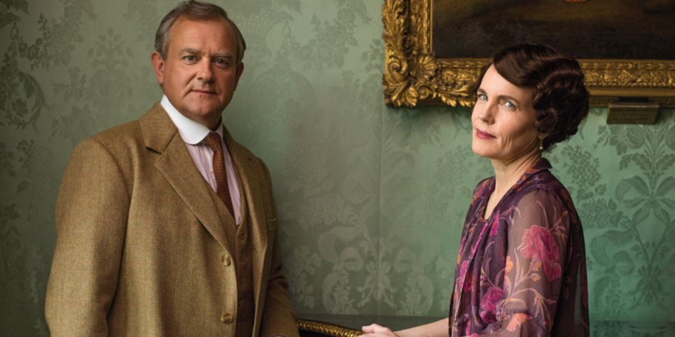 Robert and Cora Crawley looking at the camera in Downton Abbey