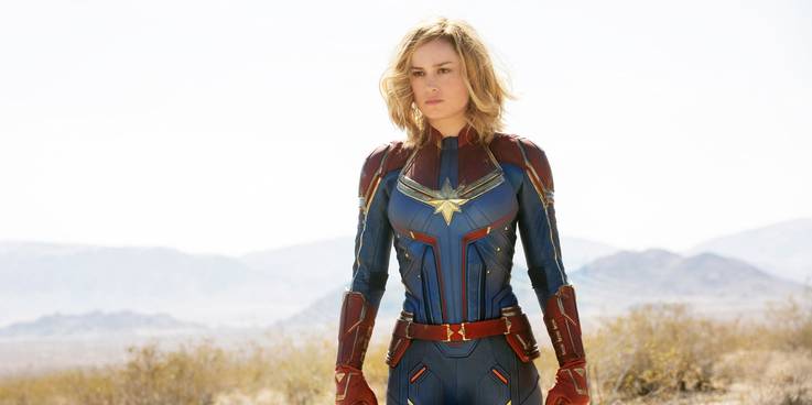 Captain Marvel standing in her suit outside in the field.jpg?q=50&fit=crop&w=737&h=368&dpr=1