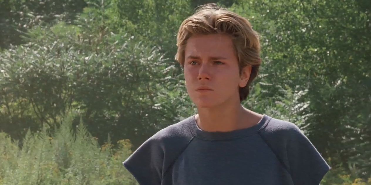 River Phoenix looking at something in Running on Empty Cropped