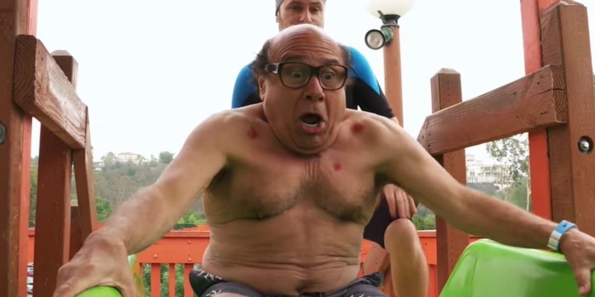 Frank and Charlie on a water slide in Its Always Sunny