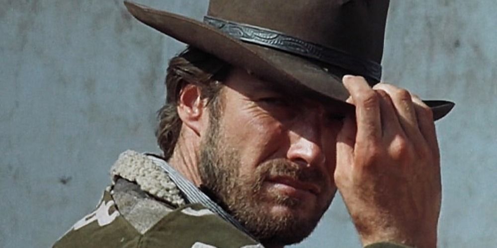 Clint Eastwood in A Fistful of Dollars tipping his hat to someone