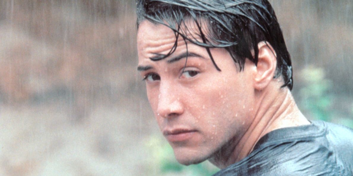 Keanu Reeves in the rain in Point Break