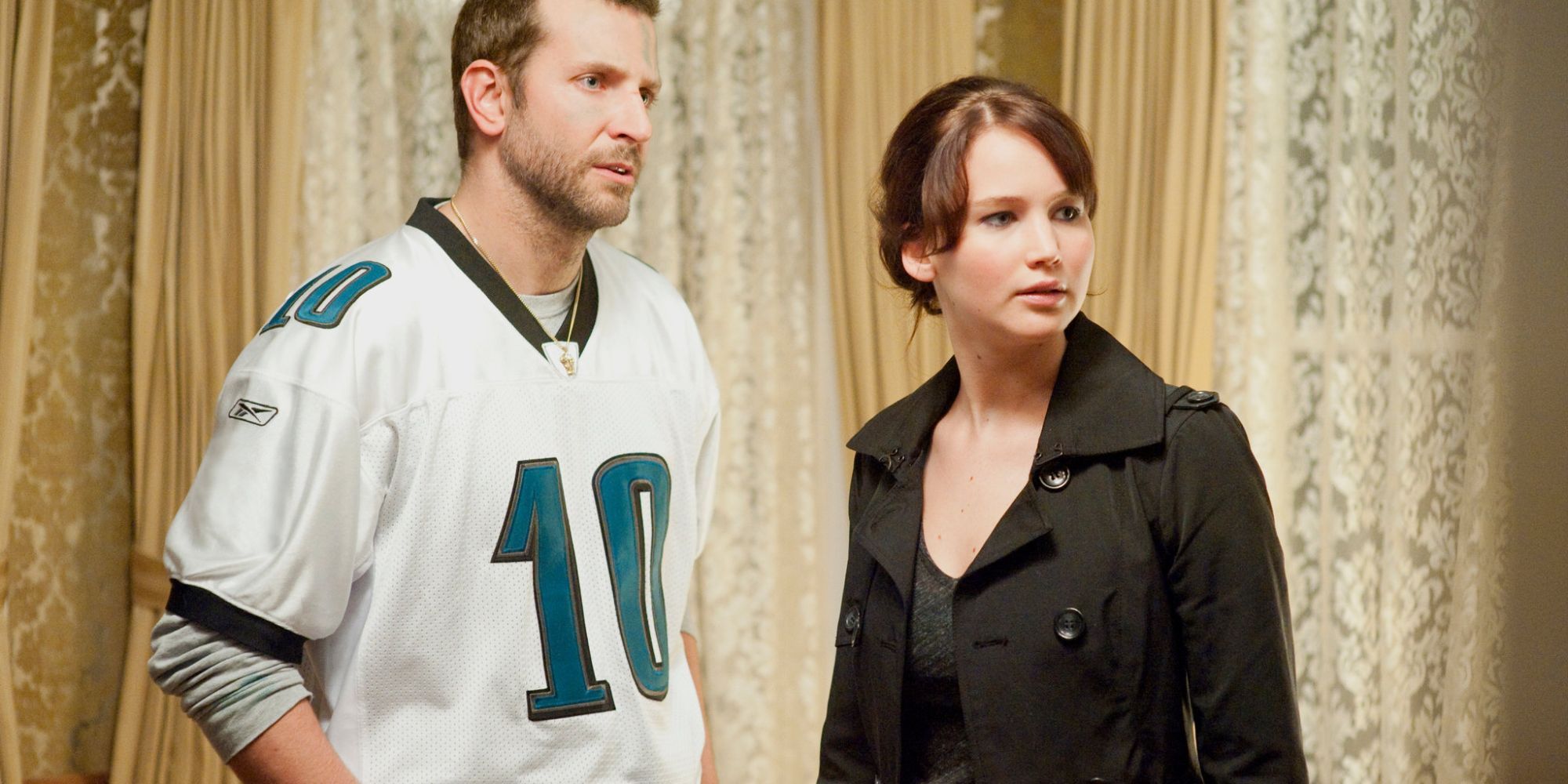 Jennifer Lawrence and Bradley Cooper wearing a NFL jersey in Silver Linings Playbook