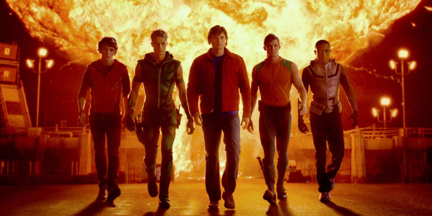 The Justice League walking away from an explosion in Smallville