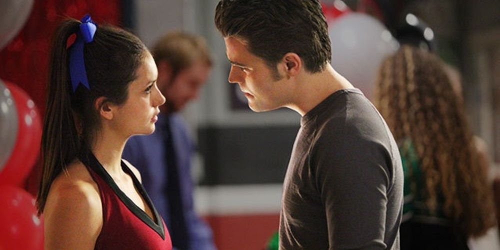 Katherine wears a cheerleader outfit and argues with Damon in The Vampire Diaries Cropped 1