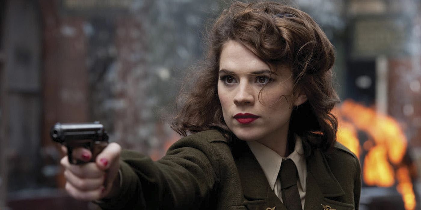 Peggy Carter pointing a gun at someone