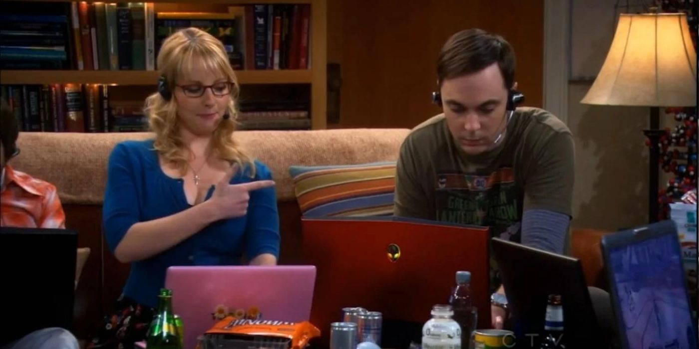 Bernadette and Sheldon gaming on a couch on TBBT