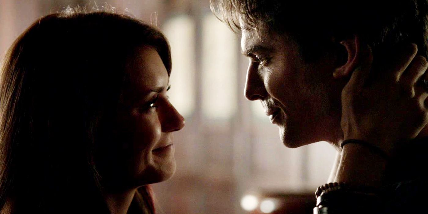 Elena holds Damons face to say goodbye