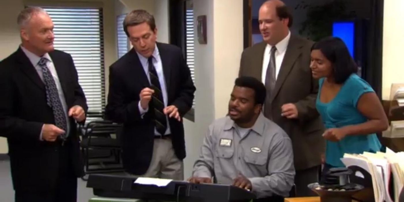 Dunder Mifflin workers singing a song at work on The Office