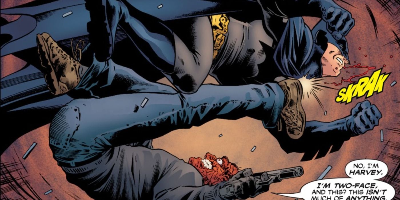 Batman fights Two Face in DC Comics.