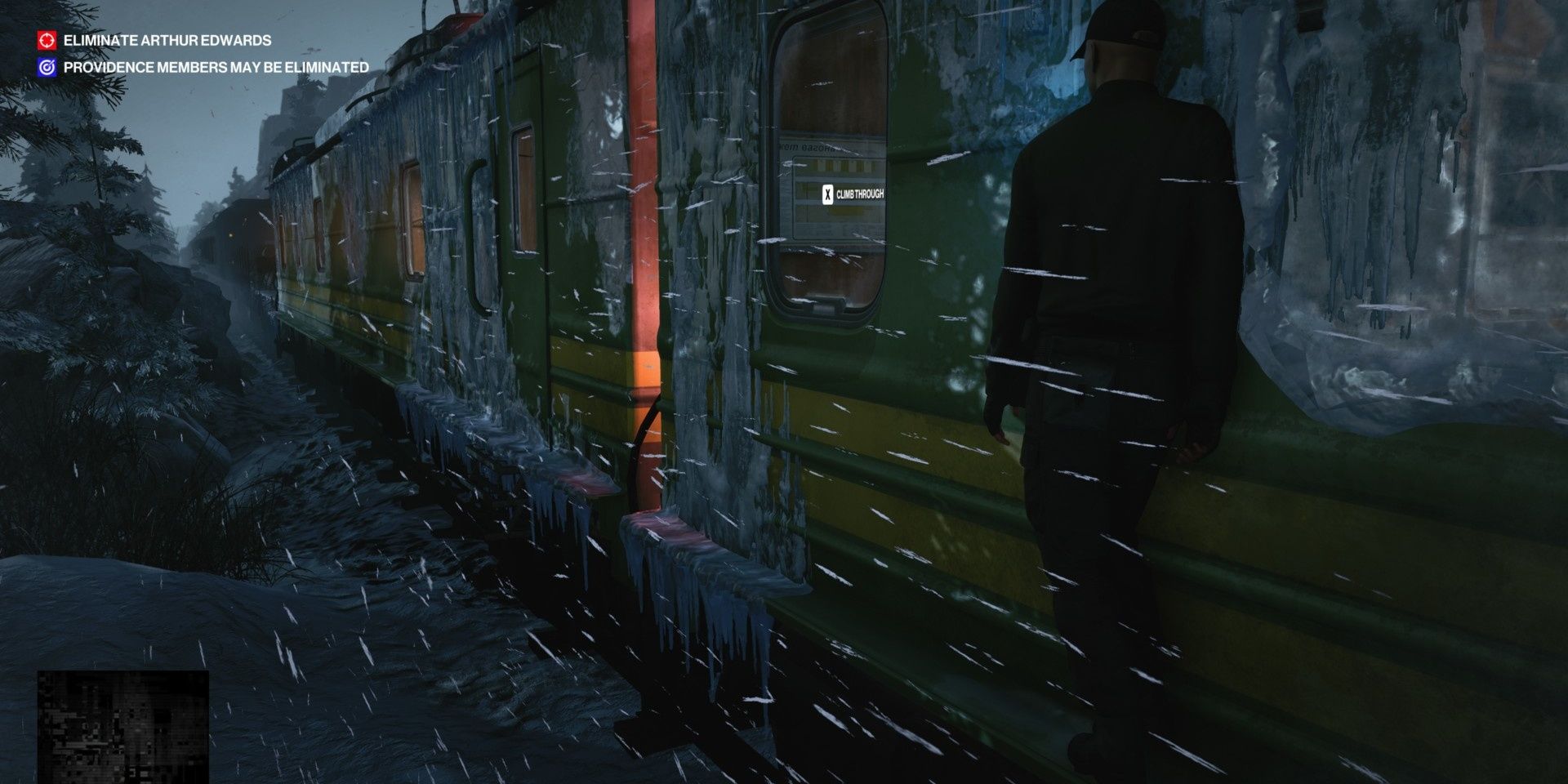 Agent 47 by the side of a train in Hitman 3 Cropped