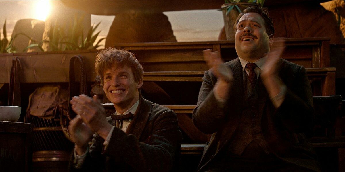 Newt and Jacob clapping in Fantastic Beasts