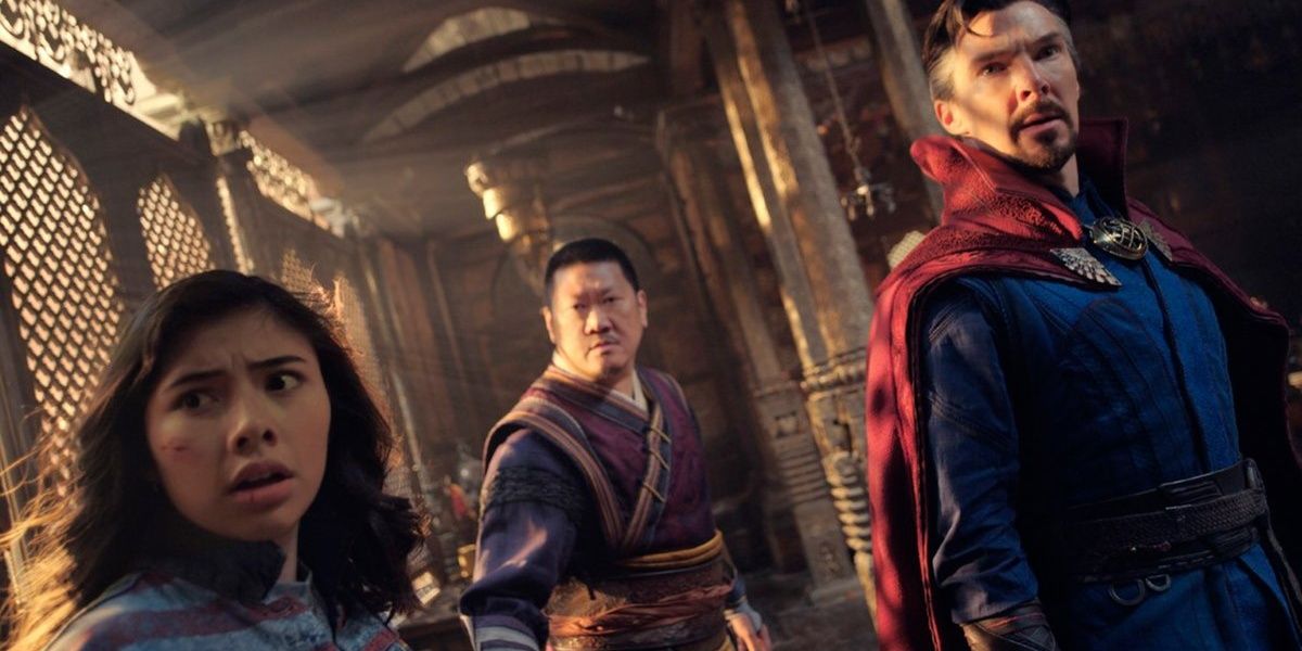 America Chavez Wong and Doctor Strange looking behind Cropped