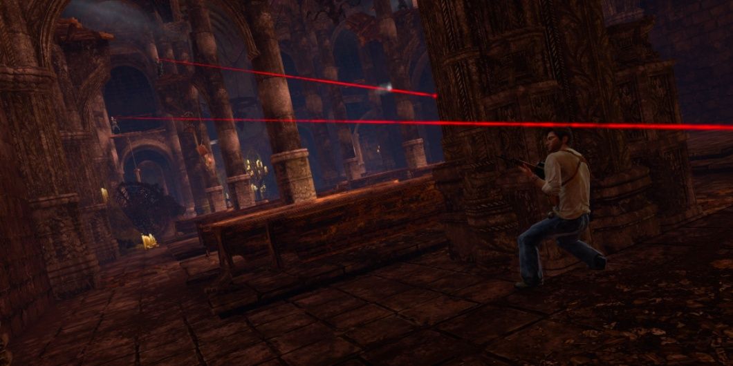 Drake takes cover from lasers in Uncharted Cropped