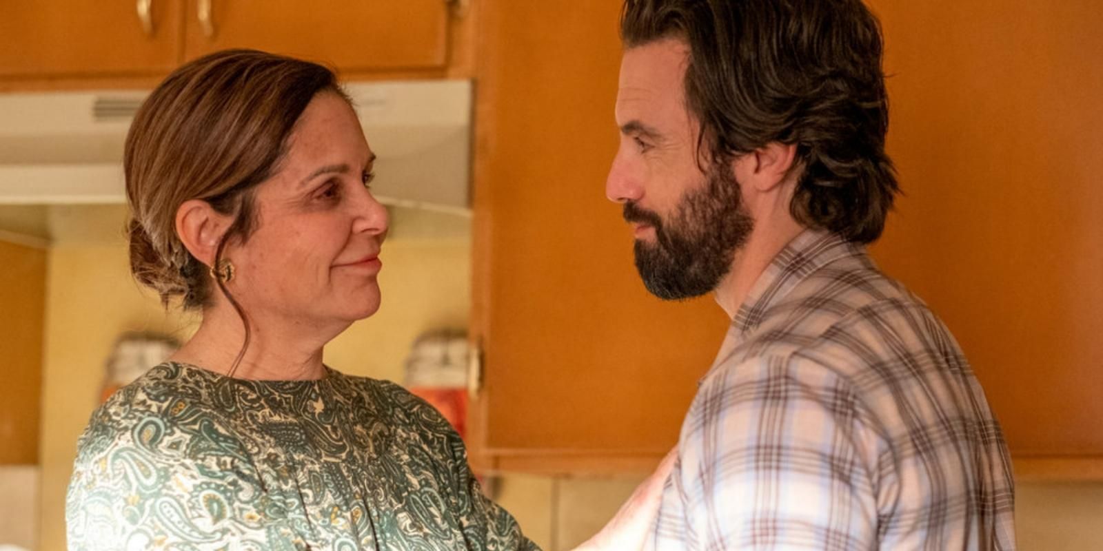 Marilyn and Jack Pearson embrace in the kitchen in This Is Us