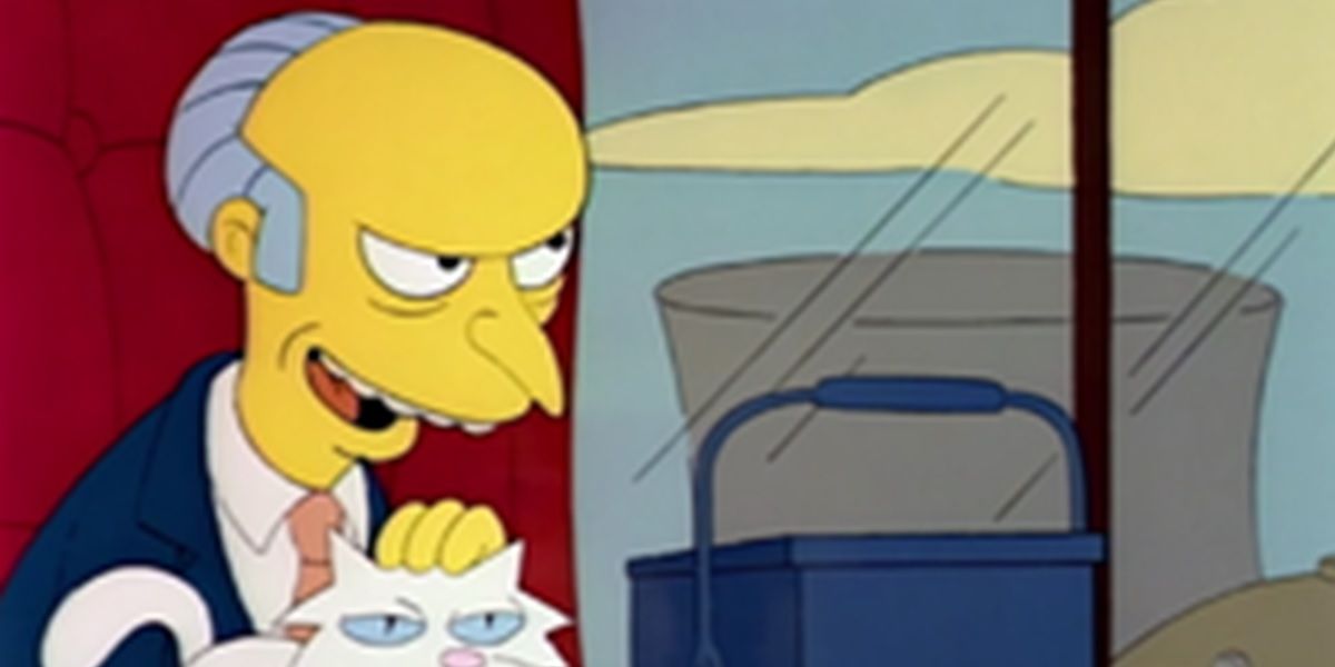 Mr Burns strokes a white cat in The Simpsons